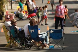 Neighbors on chairs at a block party