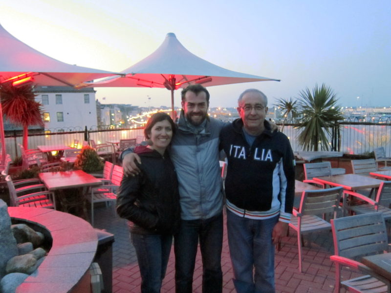 My wife Amy, me, and my father John (right) on a terrace overlooking St Peter Port.